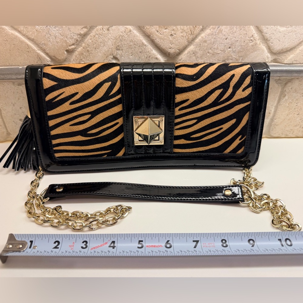 WHBM Black Patent and Tan Women's Clutch Bag With Tassel and Chain Strap